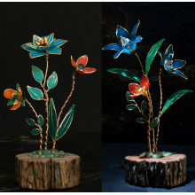 Resin and wire flowers on driftwood