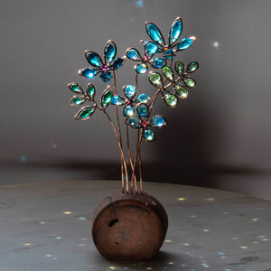 A BLUE BOUQUET OF FLOWERS ON A LOG  ... WINDOWSILL SUNCATCHER