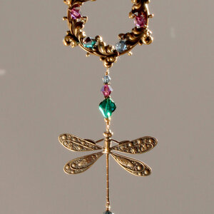 AUBERGINE, EMERALD AND MOUNTAIN BLUE DRAGONFLY SWAROVSKI CRYSTAL WINDOW SUNCATCHER WITH FLORAL FRAME