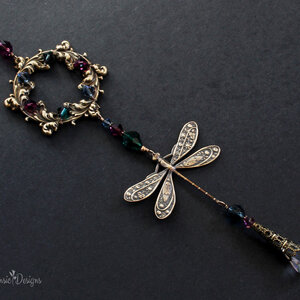 AUBERGINE, EMERALD AND MOUNTAIN BLUE DRAGONFLY SWAROVSKI CRYSTAL WINDOW SUNCATCHER WITH FLORAL FRAME