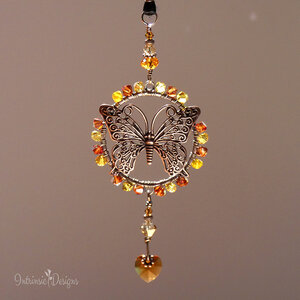 RESERVED FOR TAMMY ... SWAROVSKI CRYSTAL BUTTERFLY CAR REAR VIEW MIRROR DANGLE IN IN YELLOWS AND GOLDS .... ADJUSTABLE