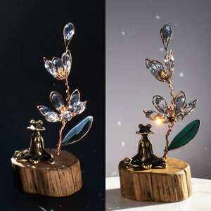 BLUE LADY ORCHID WITH A BRASS YOGA FROG INCENSE BURNER ON A WOOD SLICE  ... WINDOWSILL SUNCATCHER .... IKEBANA STYLE