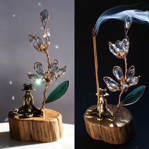 BLUE LADY ORCHID WITH A BRASS YOGA FROG INCENSE BURNER ON A WOOD SLICE  ... WINDOWSILL SUNCATCHER .... IKEBANA STYLE