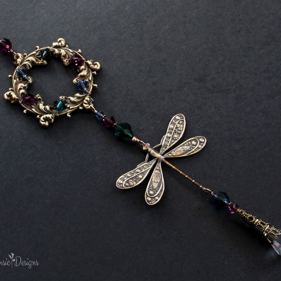AUBERGINE, EMERALD AND MOUNTAIN BLUE DRAGONFLY SWAROVSKI CRYSTAL WINDOW SUNCATCHER WITH FLORAL FRAME