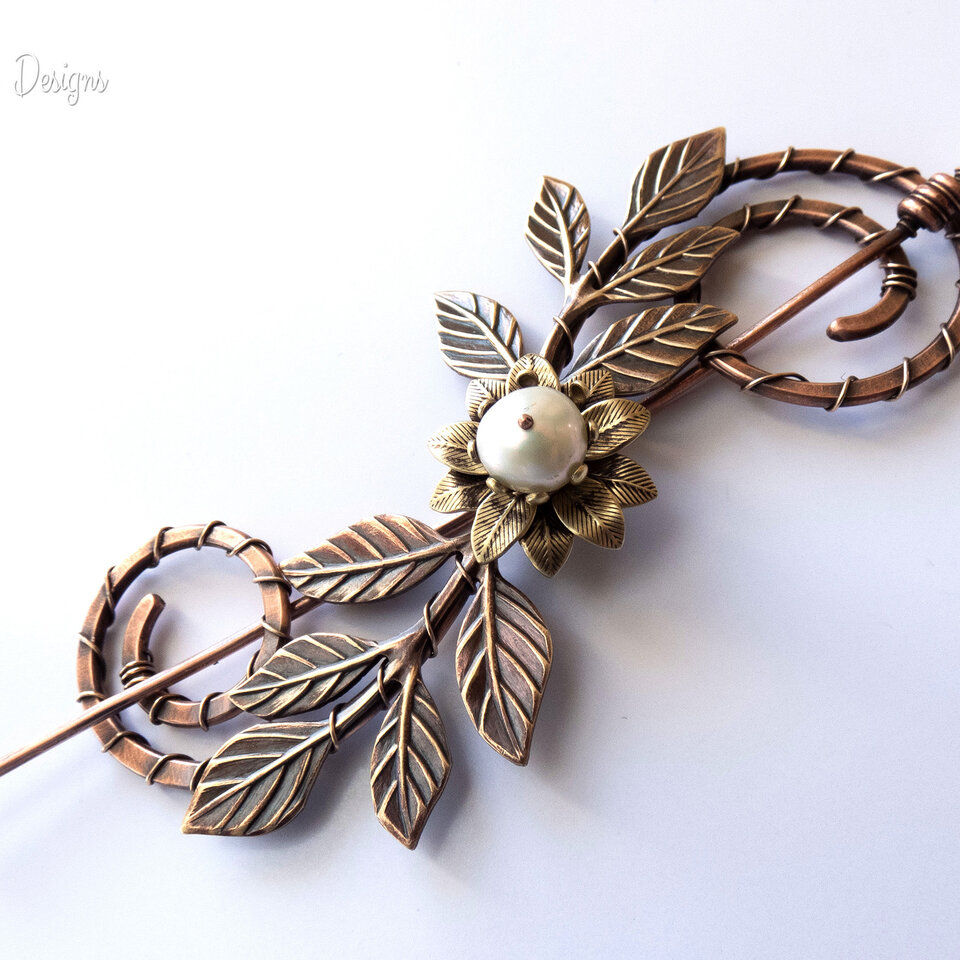SPIRAL COPPER SHAWL PIN/ SWEATER PIN WITH A FRESHWATER PEARL AND BRASS FLOWER, BRASS LEAVES AND MIXED METALS