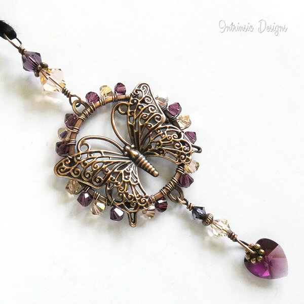 SWAROVSKI CRYSTAL BUTTERFLY CAR REARVIEW MIRROR DANGLE IN PEACH AND PURPLE .... ADJUSTABLE